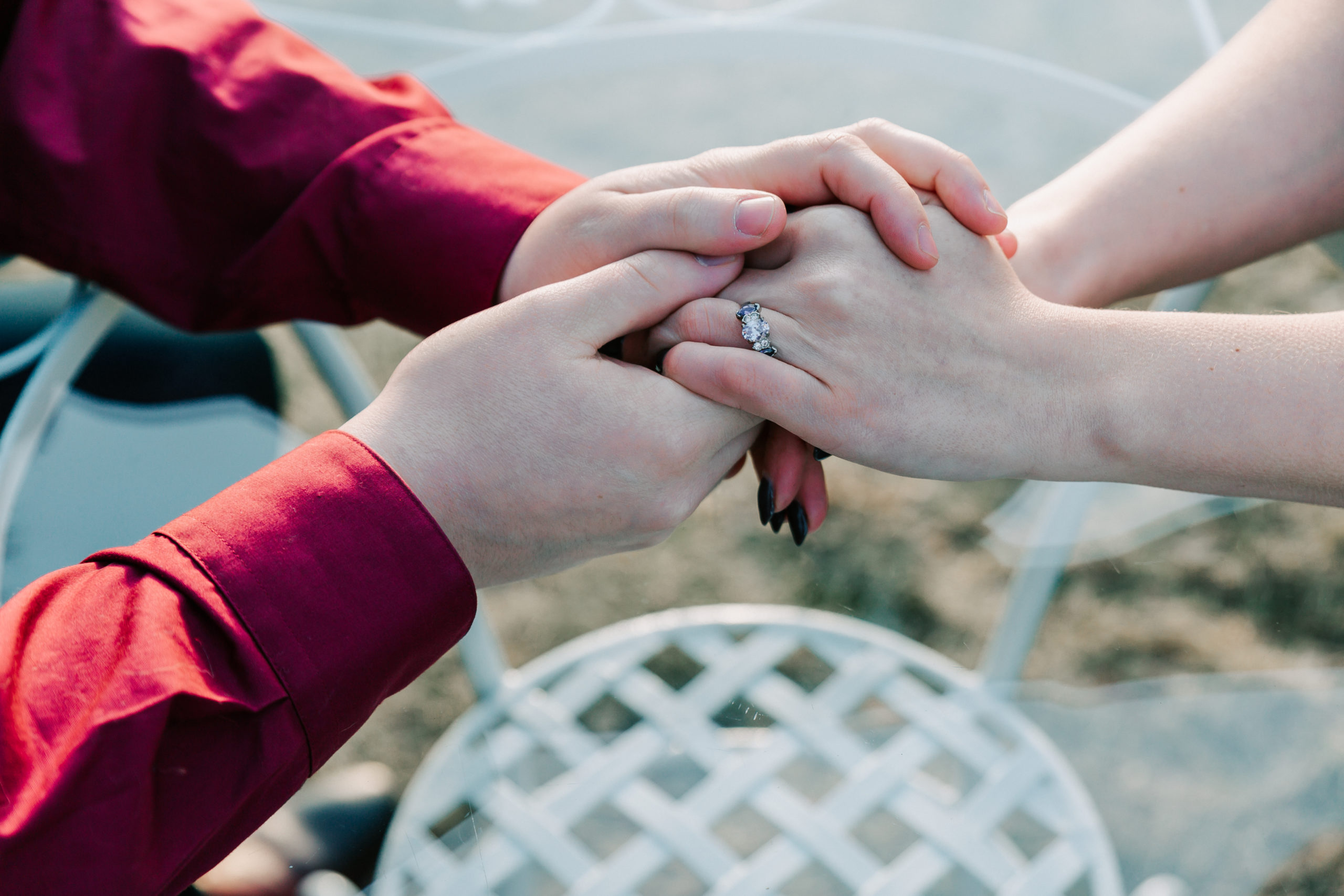 detail shot of couple's hands at their Cape Cod outdoor wedding venues