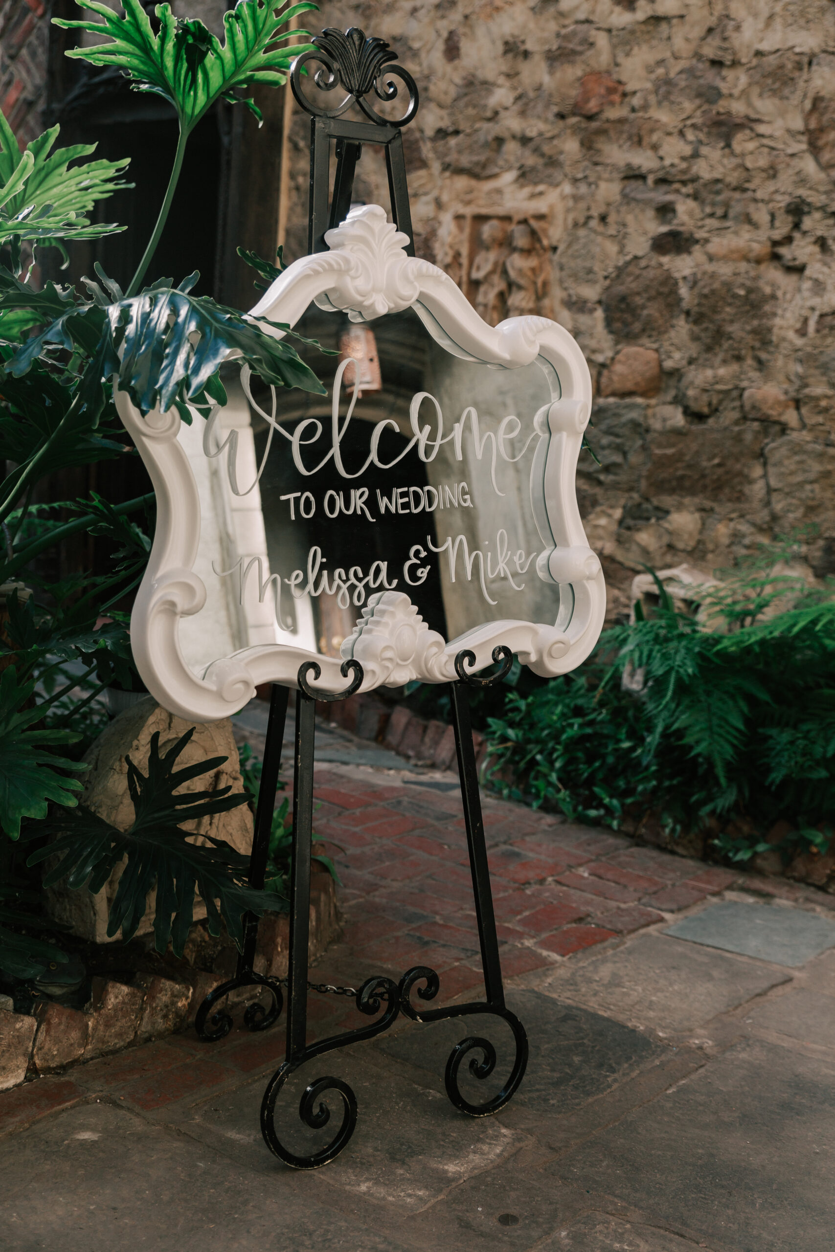A custom wedding welcome sign from INKED by Jackie, a custom Boston wedding invitation & signage designer