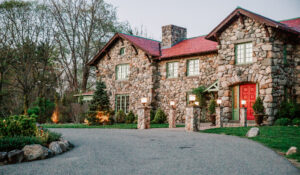 the exterior of Willowdale Estate, an elegant mansion wedding venue in Topsfield, MA