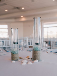 table centerpieces at a beach-themed wedding in the Eventide room of the Newport Beach House