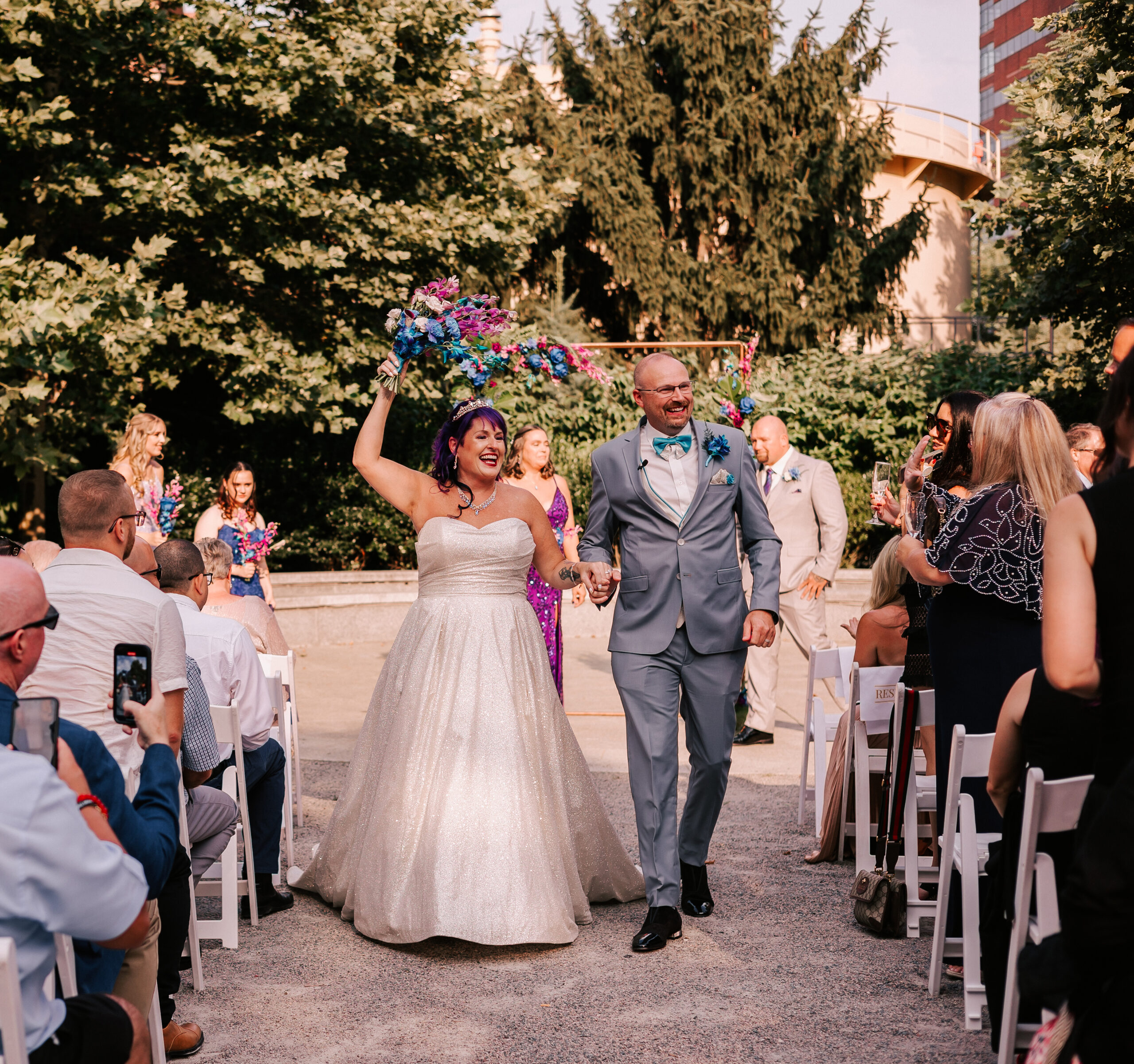 bride and groom recessional after wedding ceremony at Glass House, a popular Cambridge wedding venue