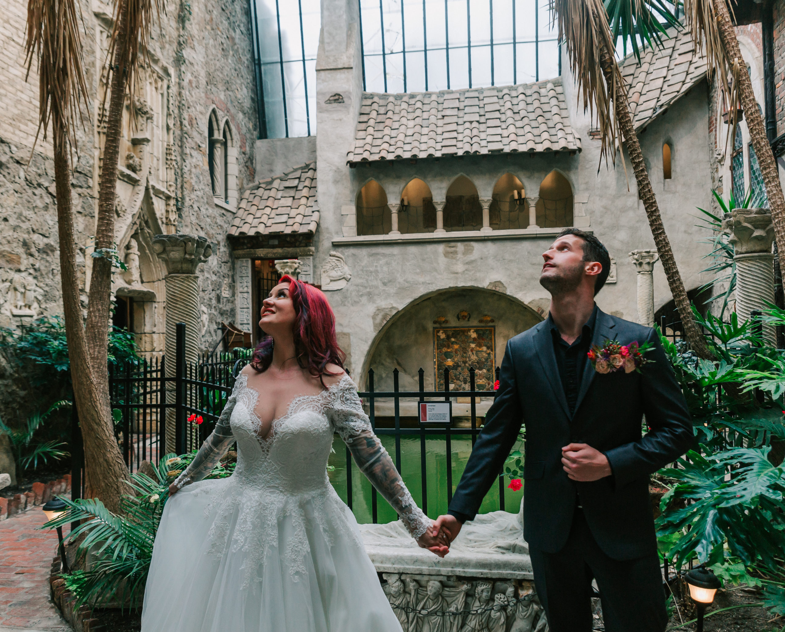 newly married couple taking in the incredible Hammond Castle Museum, captured by Vivid Instincts Photography