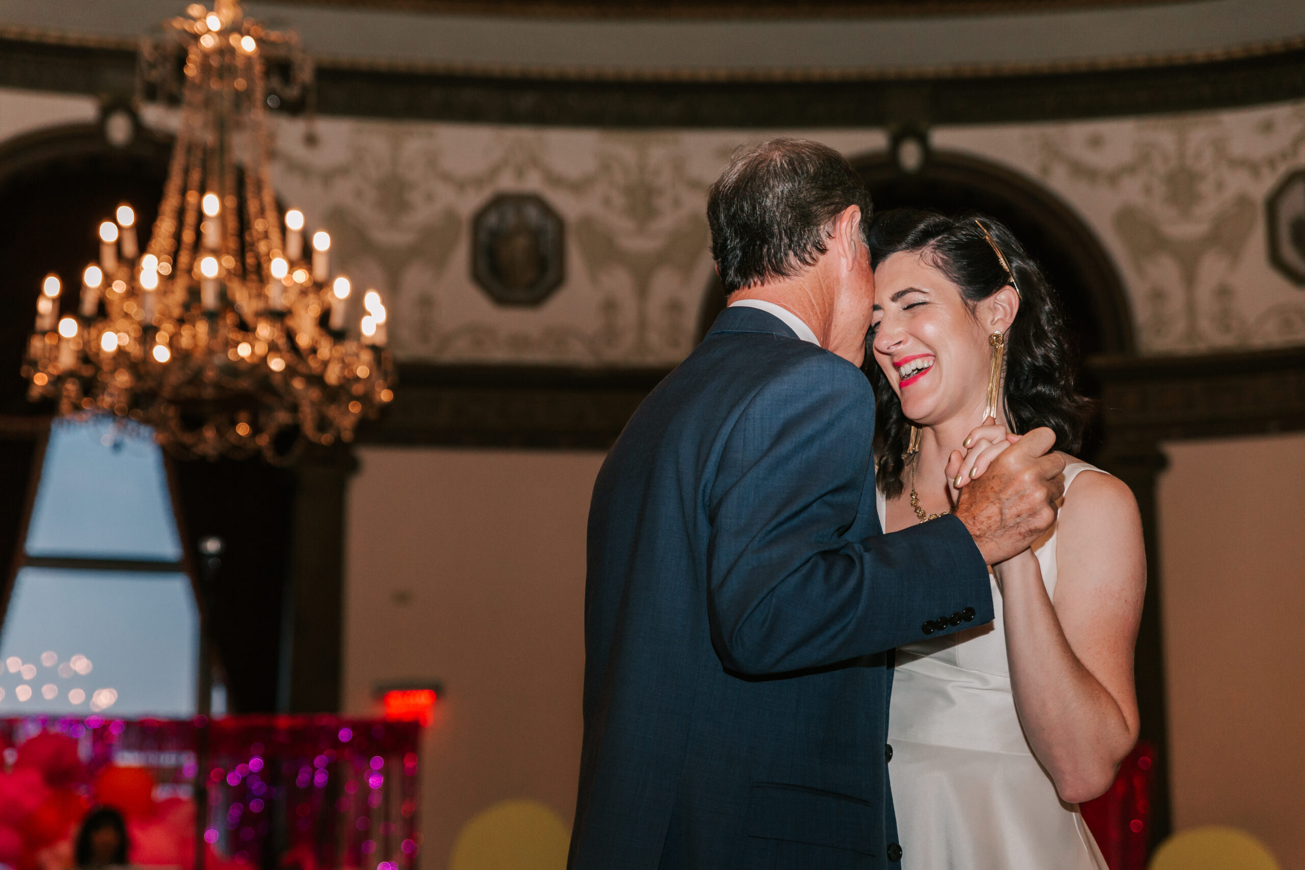 a bride and her father dancing at her wedding reception in the grand ballroom of the Graduate Hotel, a unique wedding venue in Rhode Island