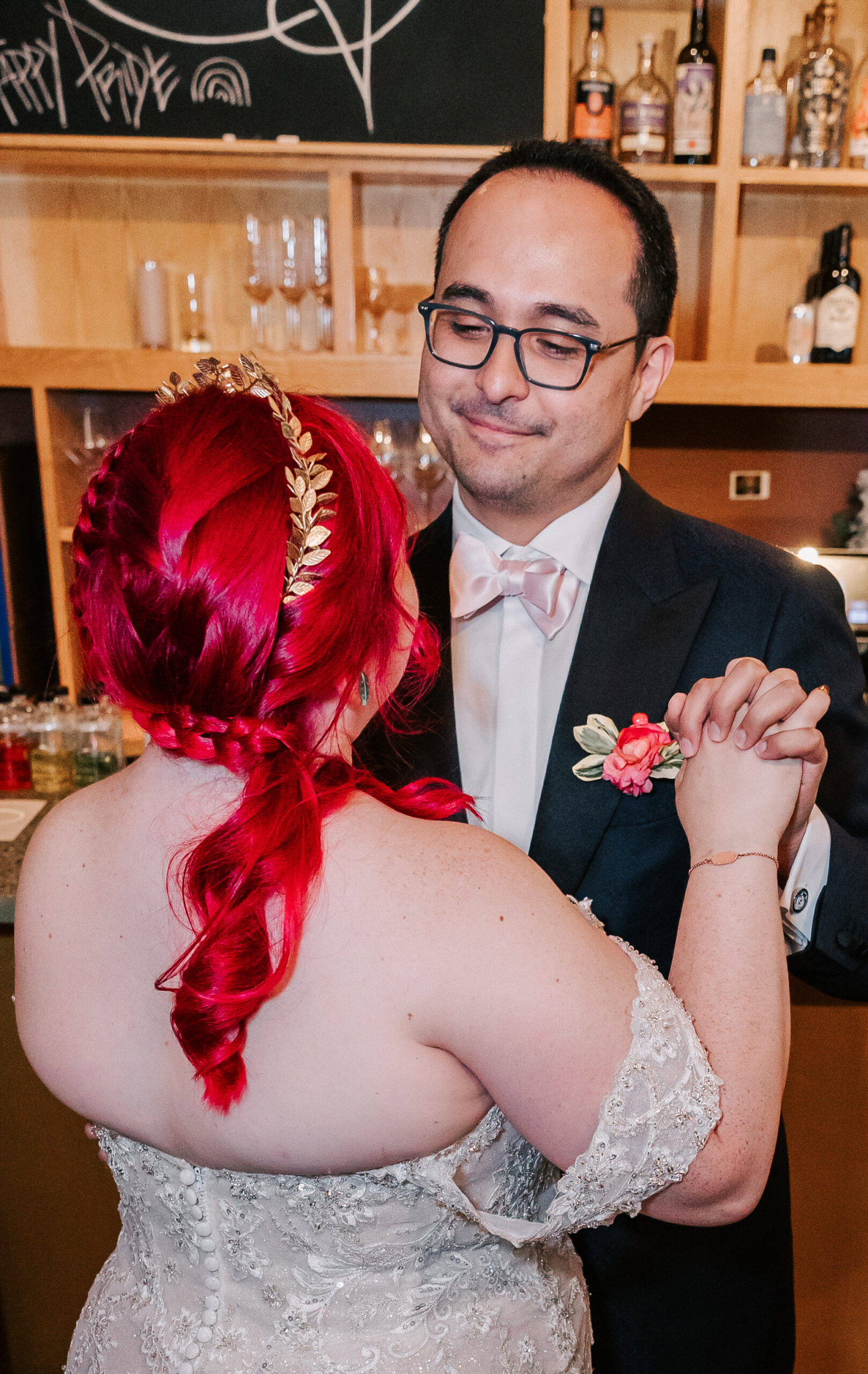alternative couple dancing at their wedding reception at Spoke Wine Bar in Somerville MA