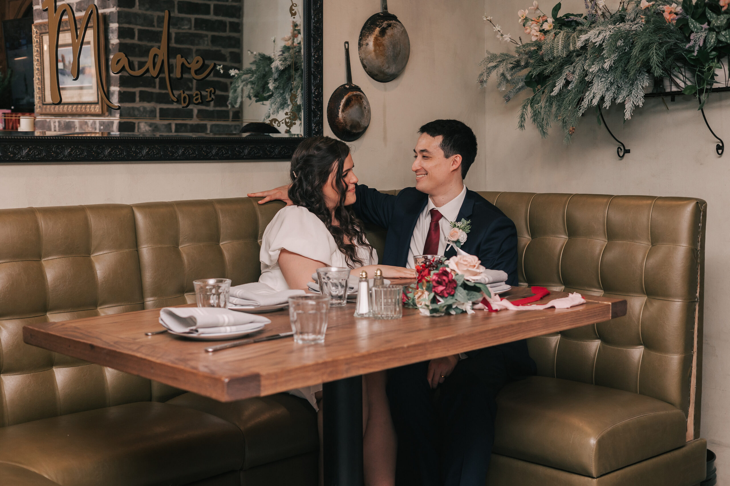 couple celebrating their wedding at Madre, a restaurant wedding venue in Massachusetts